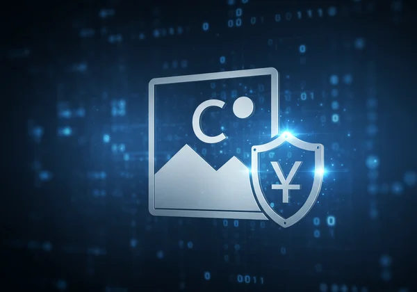 A shield icon protecting a digital photograph with a copyright symbol