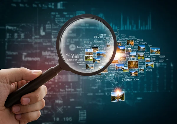 Magnifying glass over keywords leading to a visible image